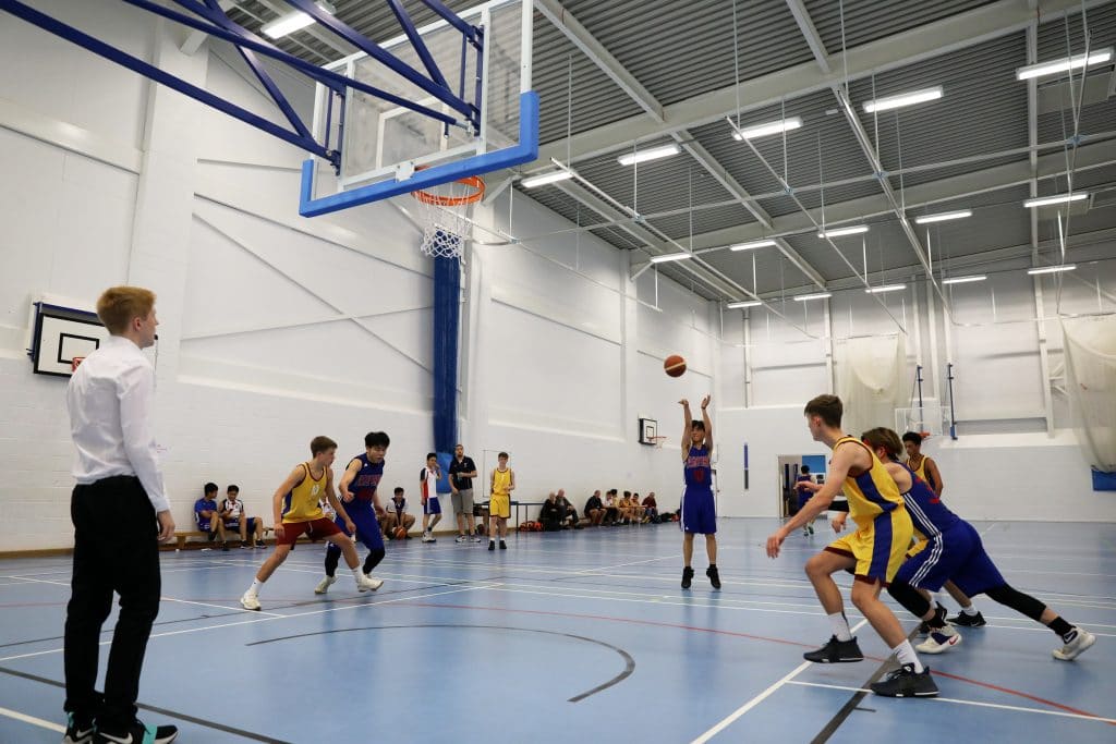 Wilson taking a free throw during an indoor basketball match